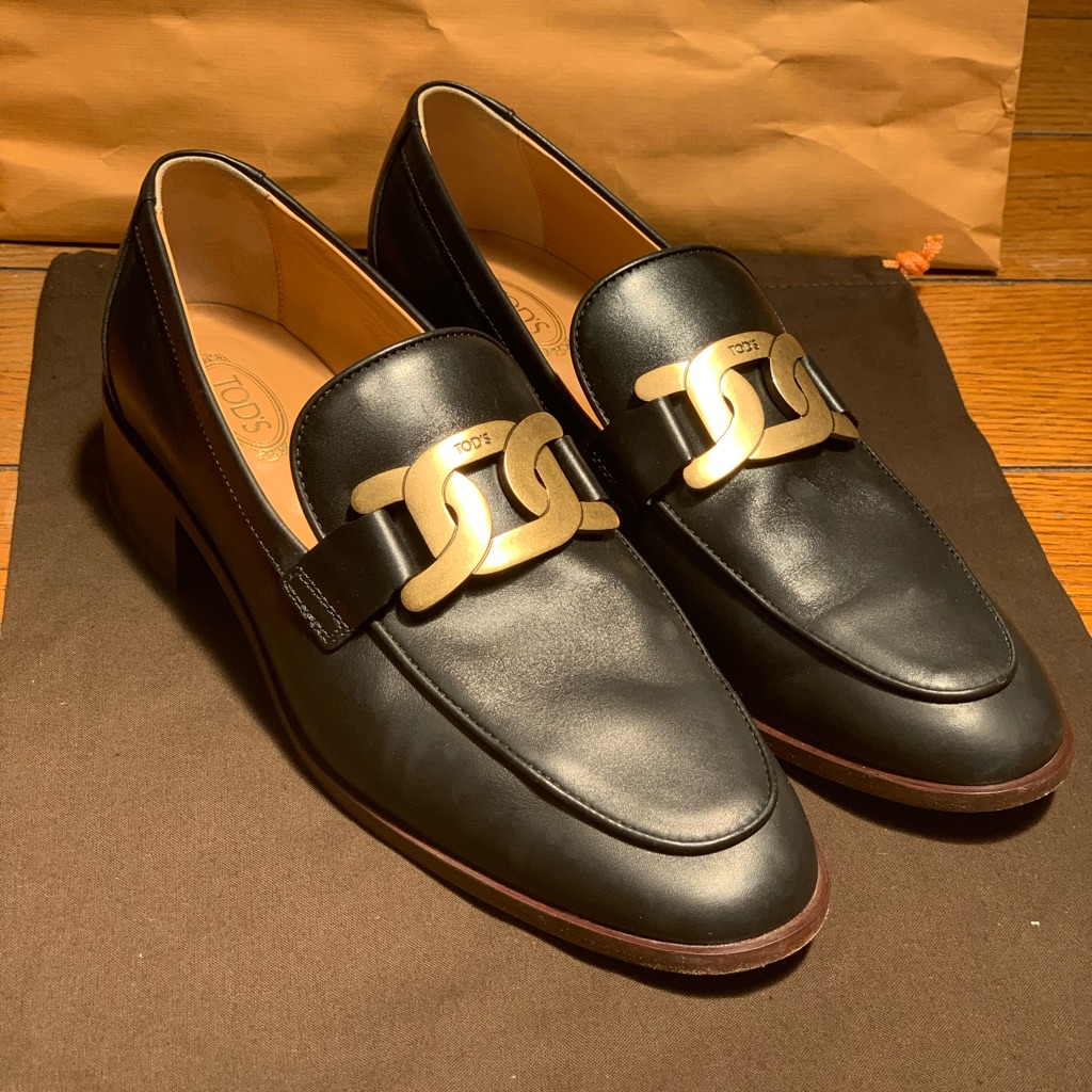 Tod's "Kate" Leather Loafers With Metallic Chain Accent